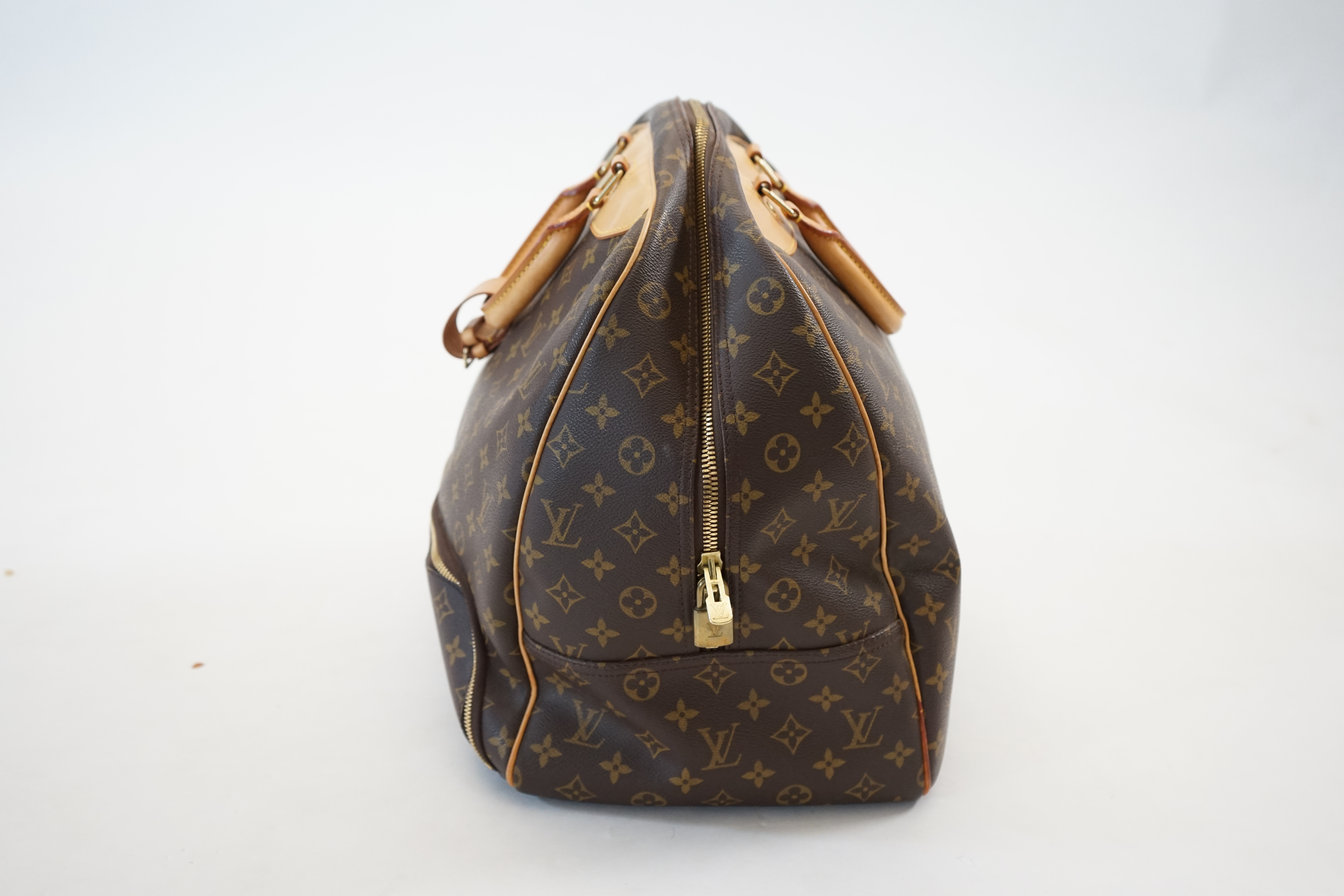 A Louis Vuitton Evasion travel bag width 38cm, depth 23cm, length 33cm, hand drop 12cm